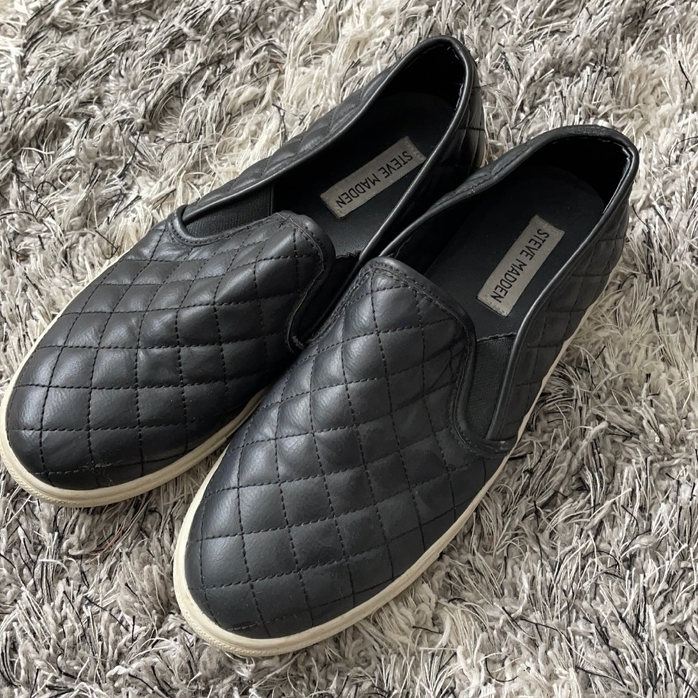 Black Steve Madden slip ons
